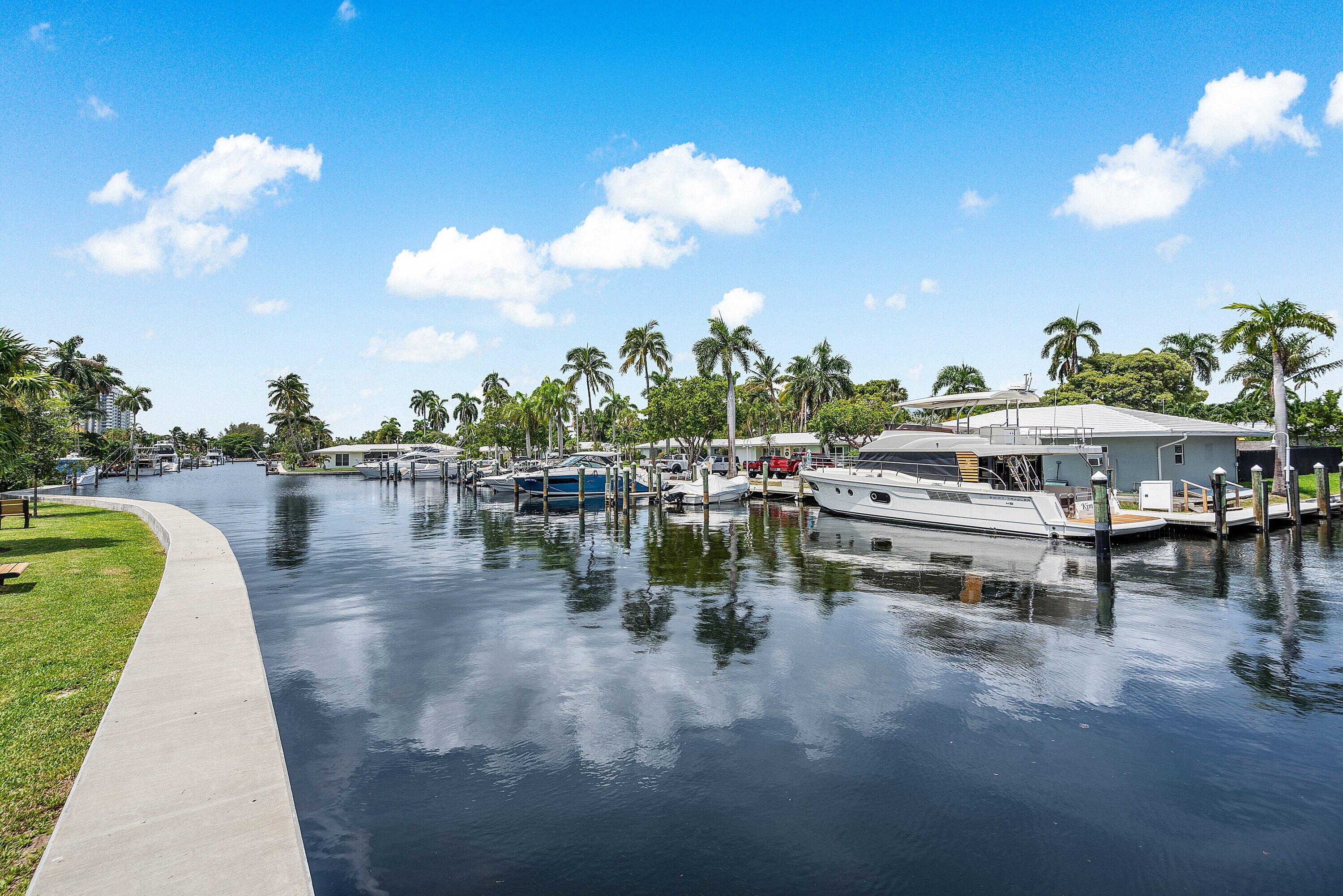 1501 South Ocean Boulevard, Unit 225 Lauderdale-by-the-Sea, FL 33062 - Photo 34 of 47 a view of a lake with sitting area