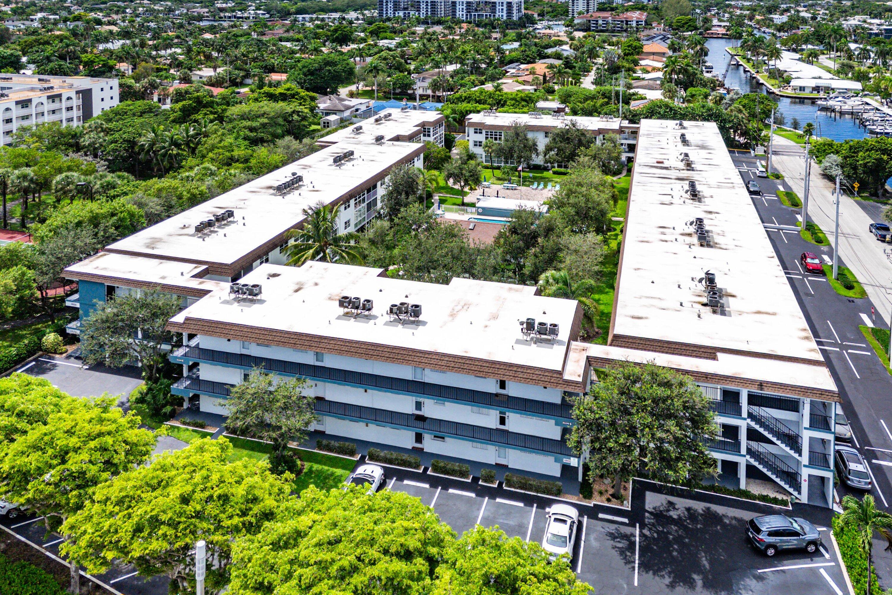 1501 South Ocean Boulevard, Unit 225 Lauderdale-by-the-Sea, FL 33062 - Photo 35 of 47 an aerial view of a house with garden space and street view