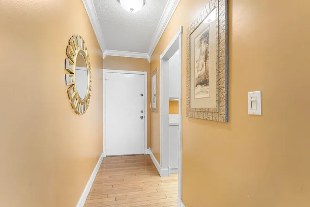 a view of a hallway with windows