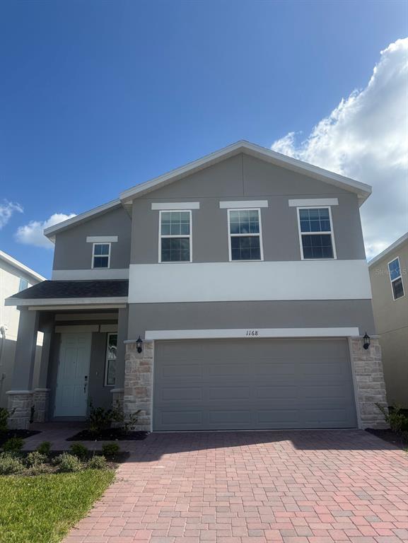1168 Happy Frst Loop DeLand, FL 32720 - Photo 1 of 1 a front view of a house