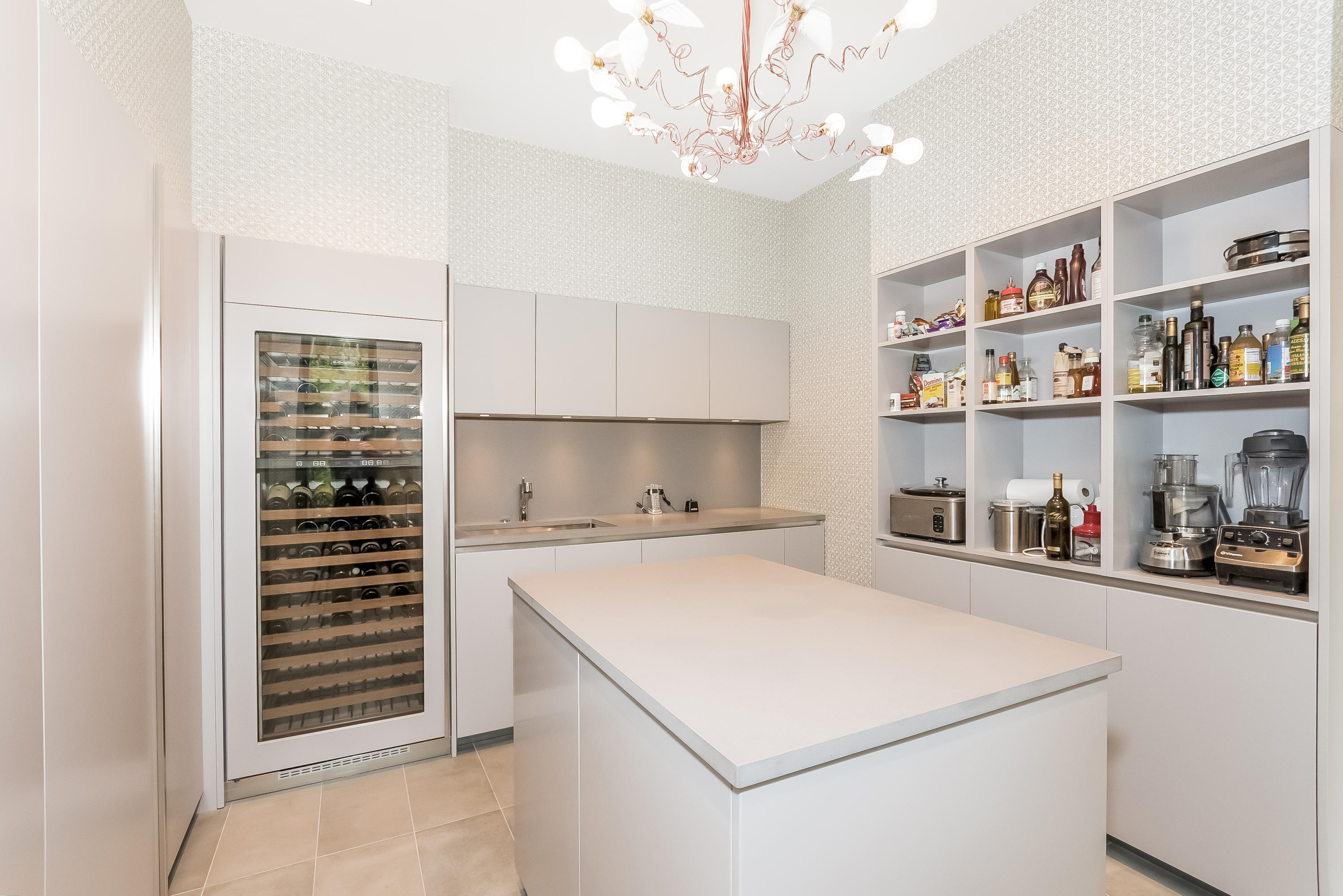 1 Beverly Place Darien, CT 06820 - Photo 14 of 45 a view of hallway with cabinets and chandelier