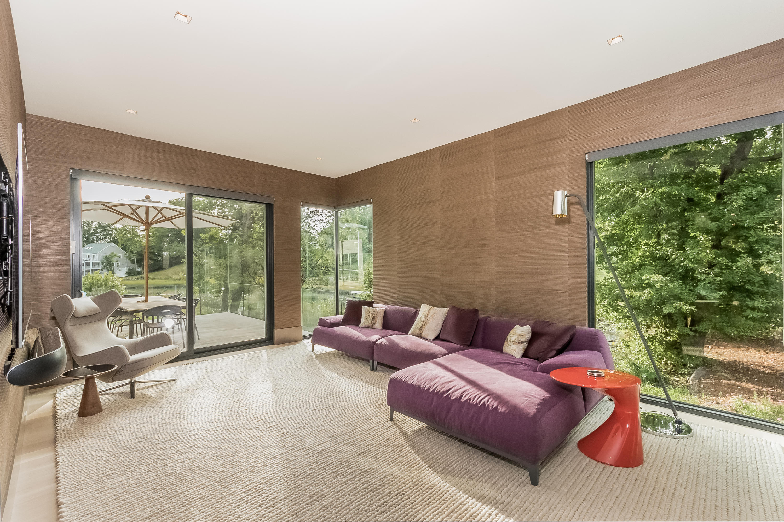 1 Beverly Place Darien, CT 06820 - Photo 16 of 45 a living room with furniture and a floor to ceiling window