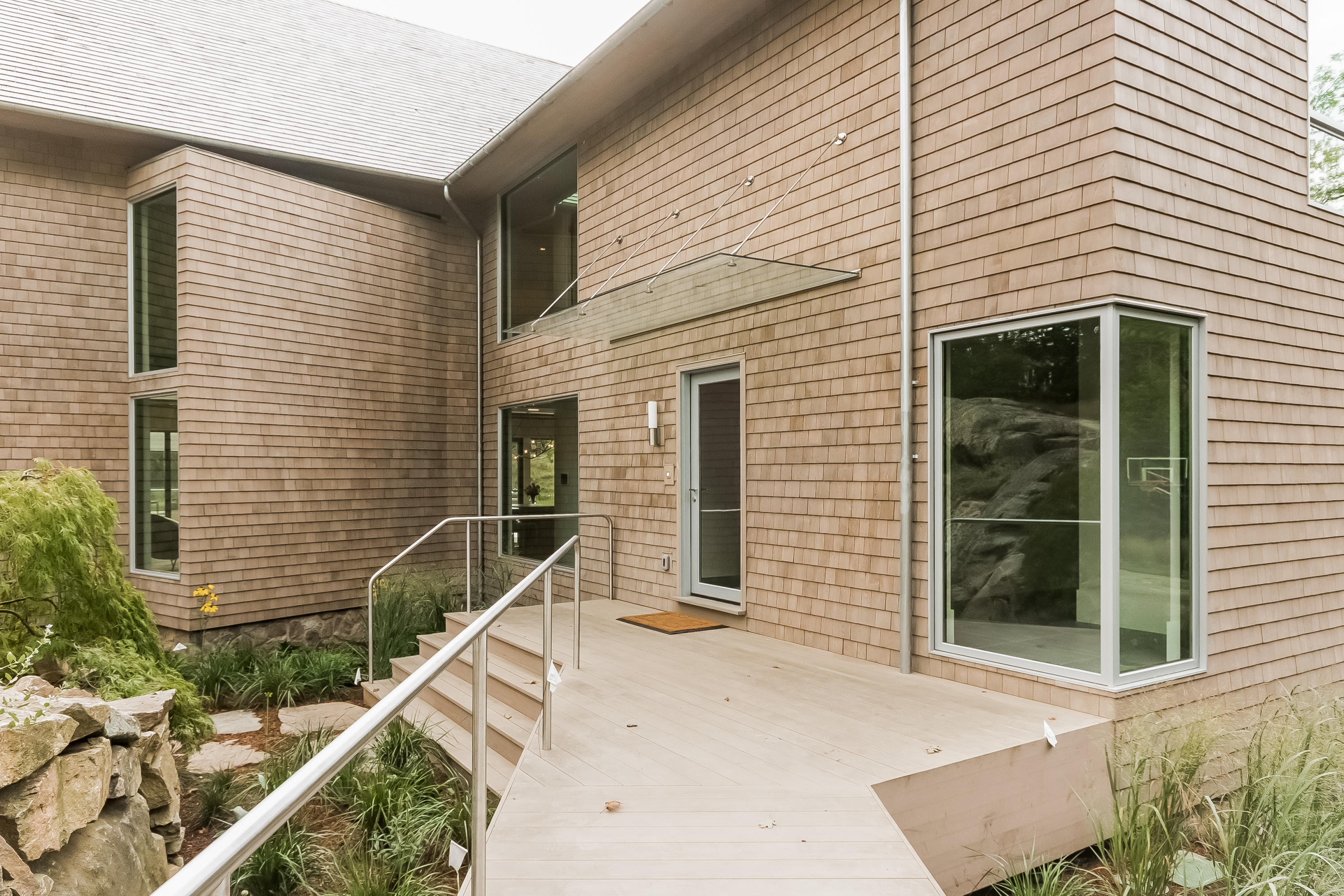 1 Beverly Place Darien, CT 06820 - Photo 37 of 45 a view of a house with large windows