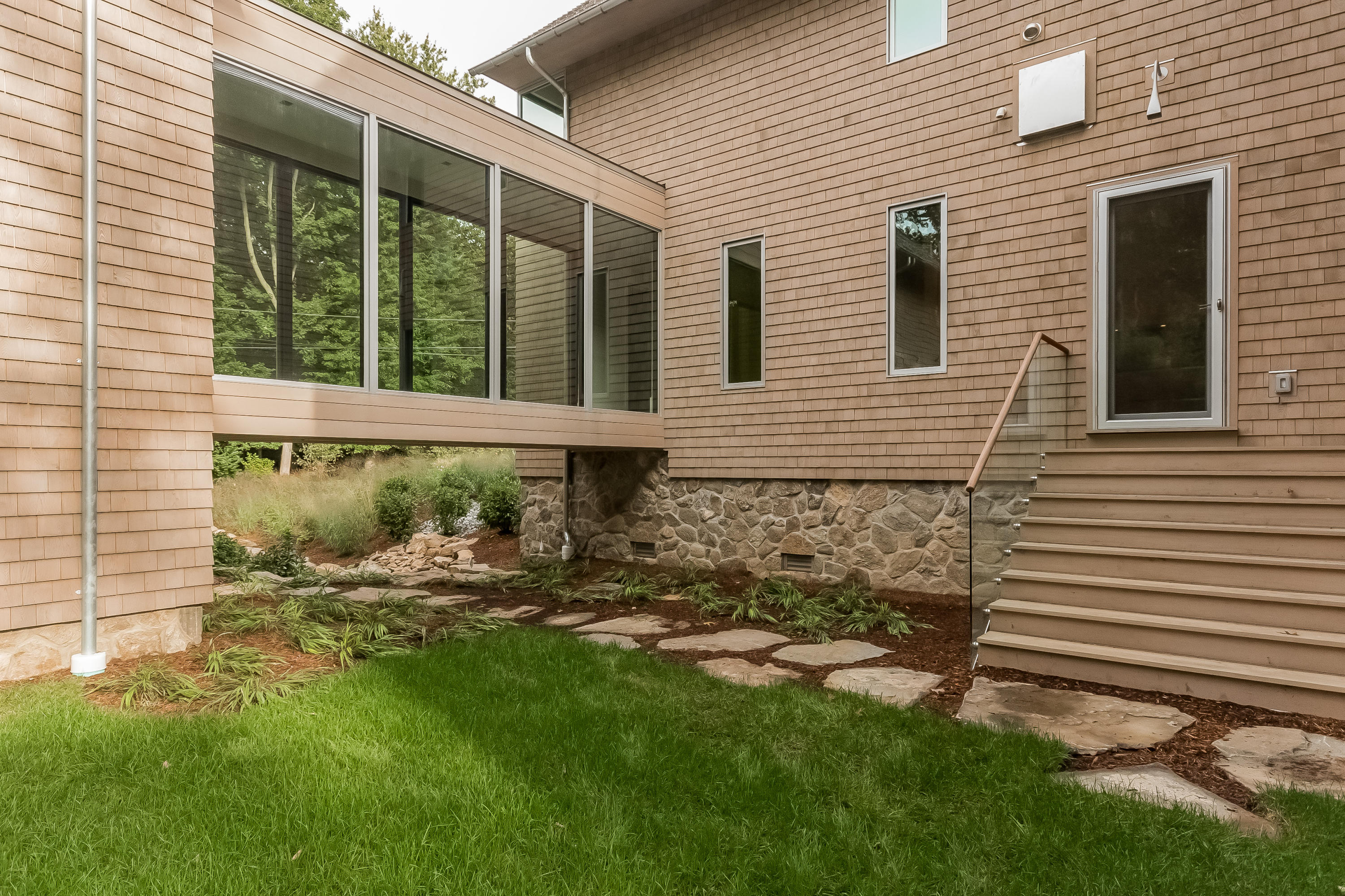 1 Beverly Place Darien, CT 06820 - Photo 38 of 45 a view of a house with a yard and sitting area