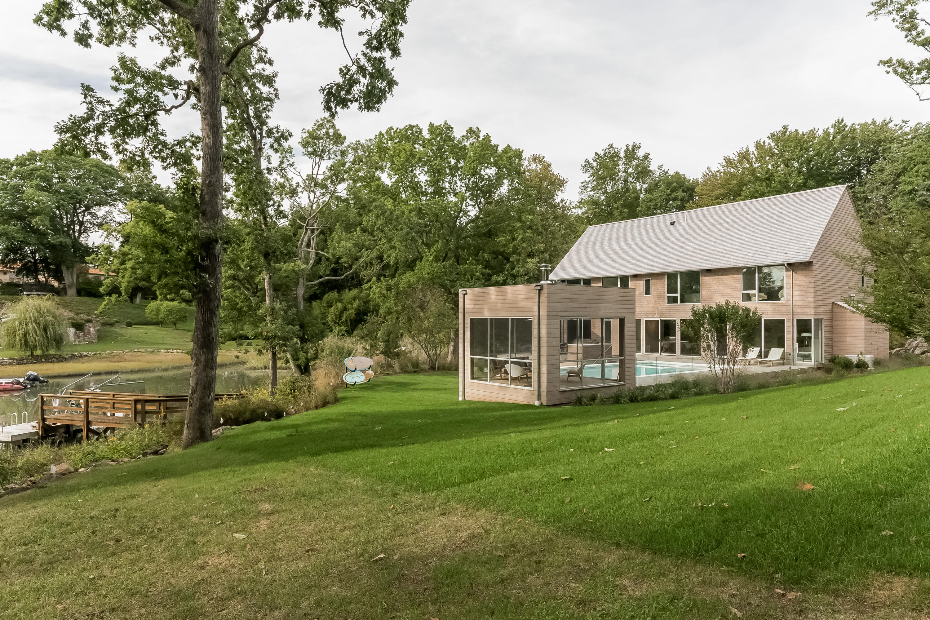 1 Beverly Place Darien, CT 06820 - Photo 39 of 45 a view of a house with a yard porch and sitting area