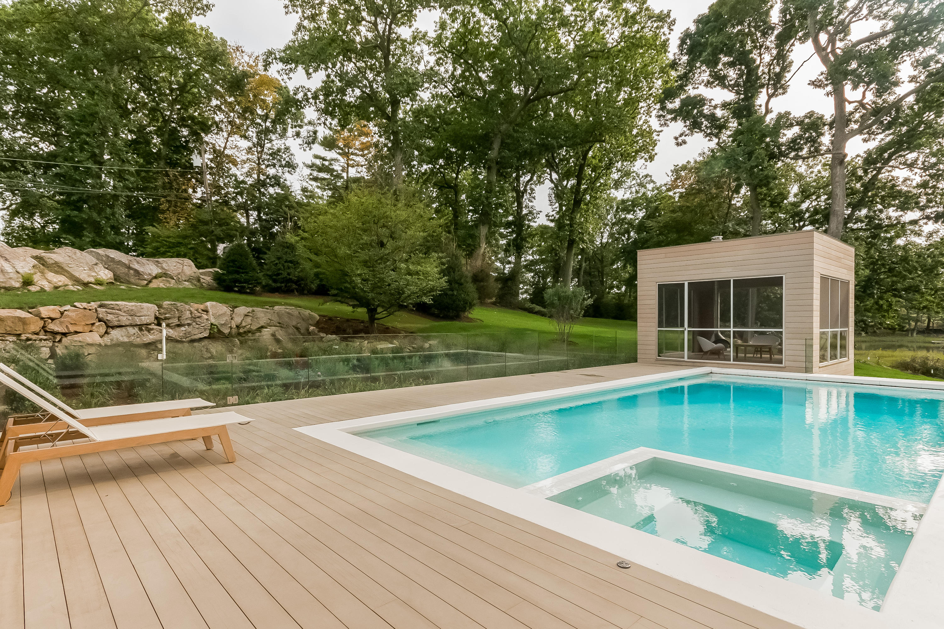 1 Beverly Place Darien, CT 06820 - Photo 6 of 45 a view of a house with pool