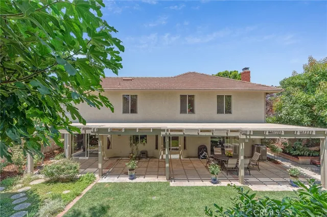 a view of a house with patio