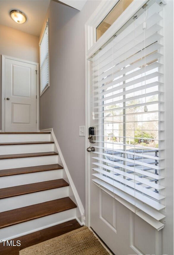1571 Rodessa Run Raleigh, NC 27607 - Photo 2 of 25 a view of a kitchen with wooden floor and a window