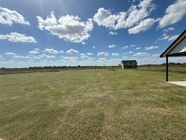 a view of an ocean yard and mountain view