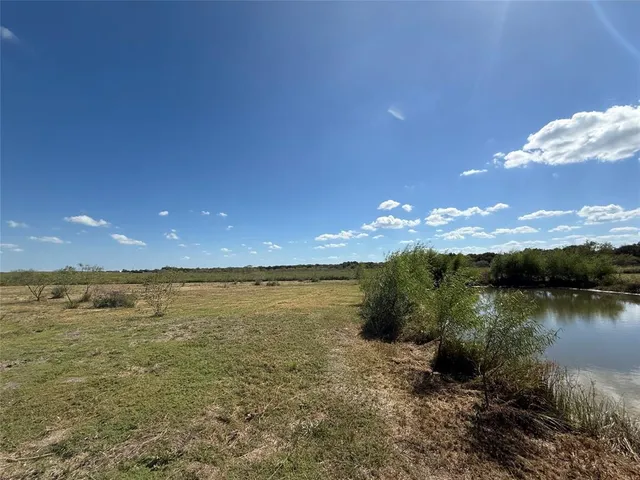 a view of an ocean and city