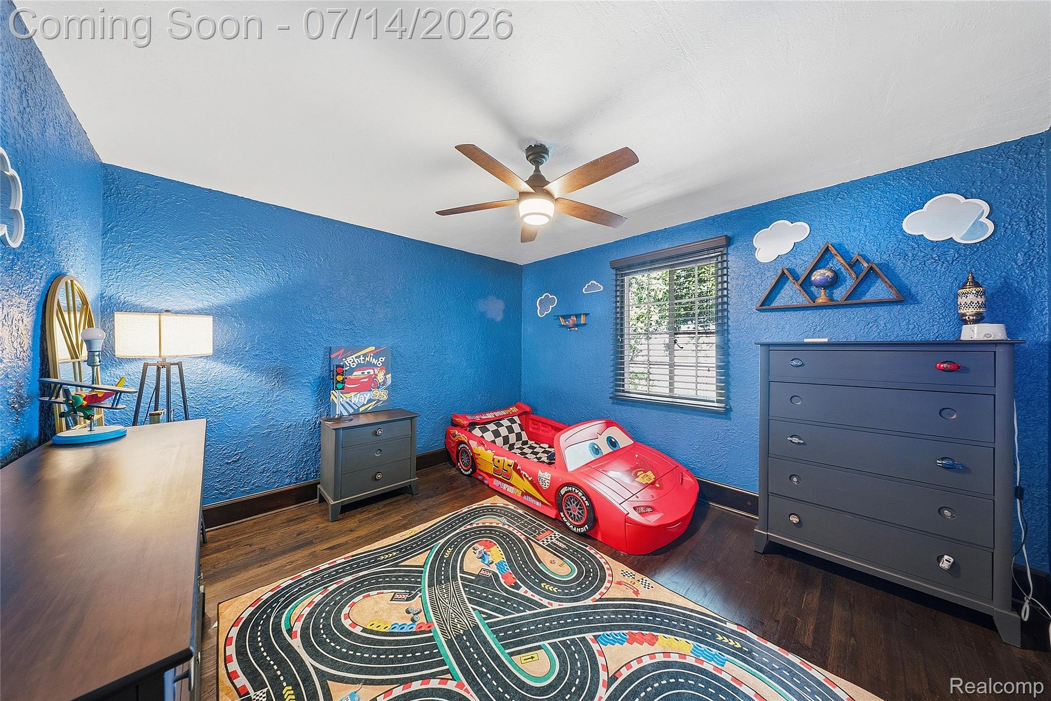 18460 Meridian Road Grosse Ile, MI 48138 - Photo 32 of 50 Interior room featuring wood-finish flooring and textured blue walls