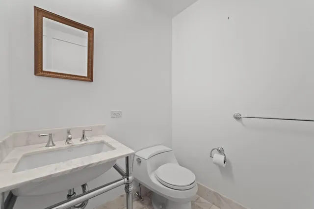 a bathroom with a sink and a toilet