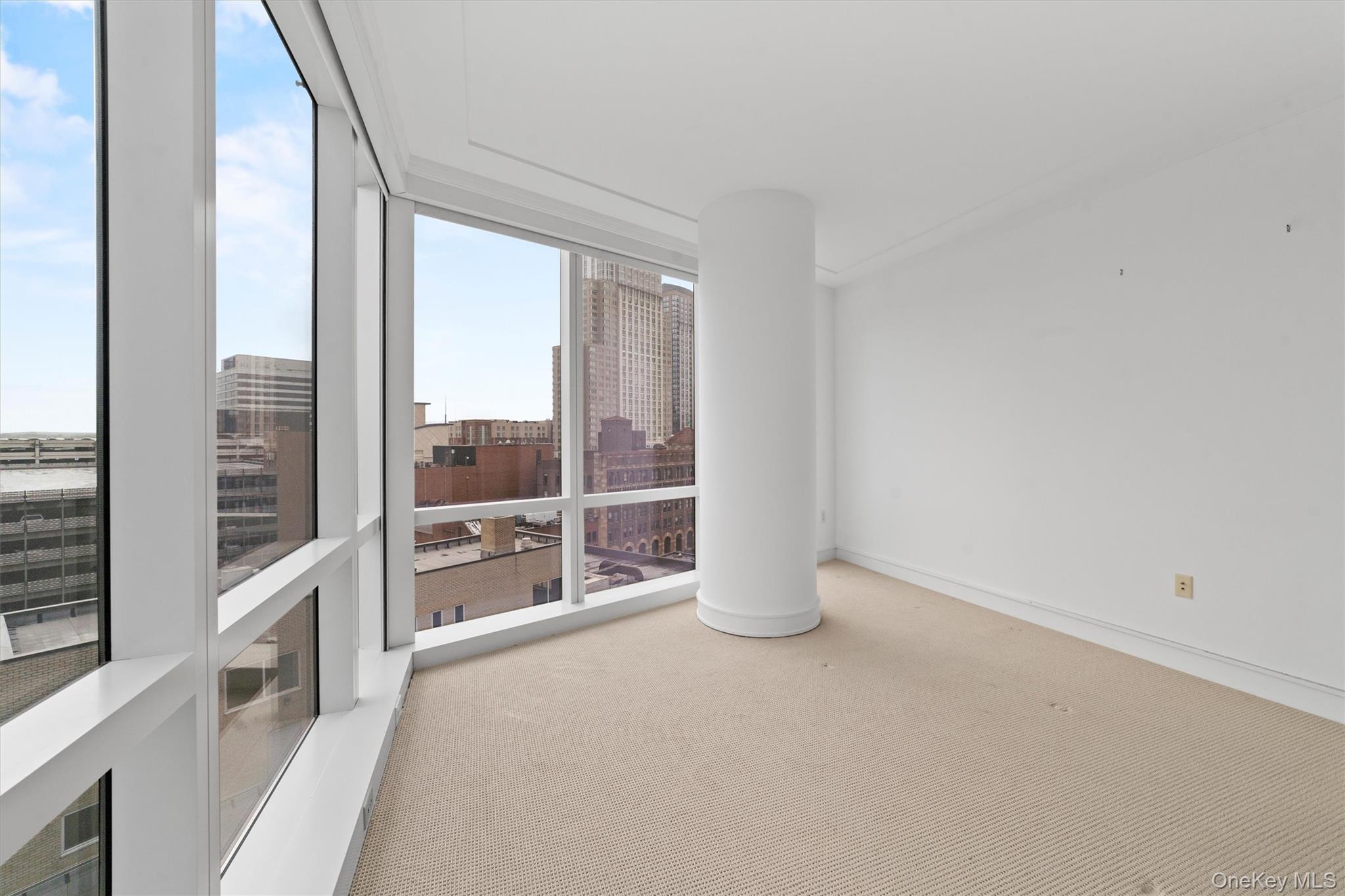 5 Renaissance Square, Unit 10G White Plains, NY 10601 - Photo 17 of 28 a view of an empty room and window