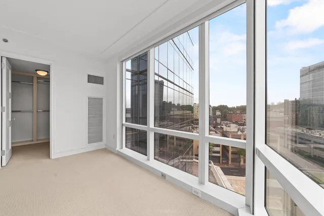 a view of an empty room and window