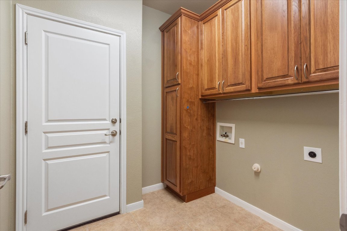 531 Deer Meadow Circle Georgetown, TX 78633 - Photo 12 of 39 Nice built-ins in laundry room