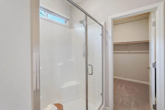 a view of an empty walk in closet