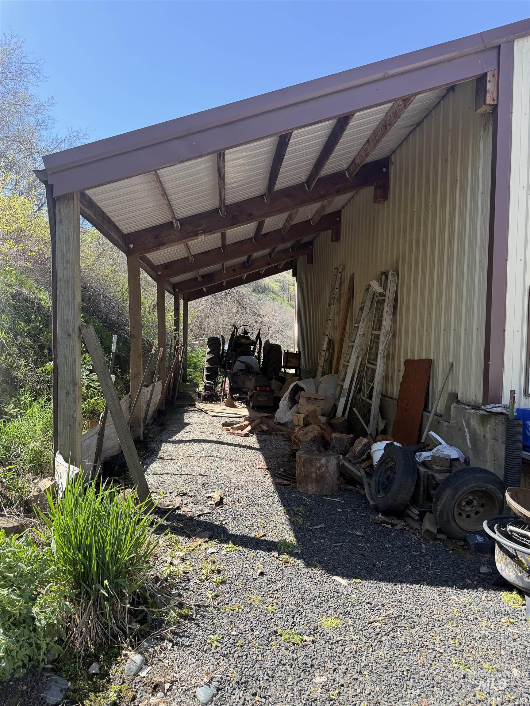 27474 North Tom Beall Road Lapwai, ID 83540 - Photo 17 of 50 View of patio with an attached carport