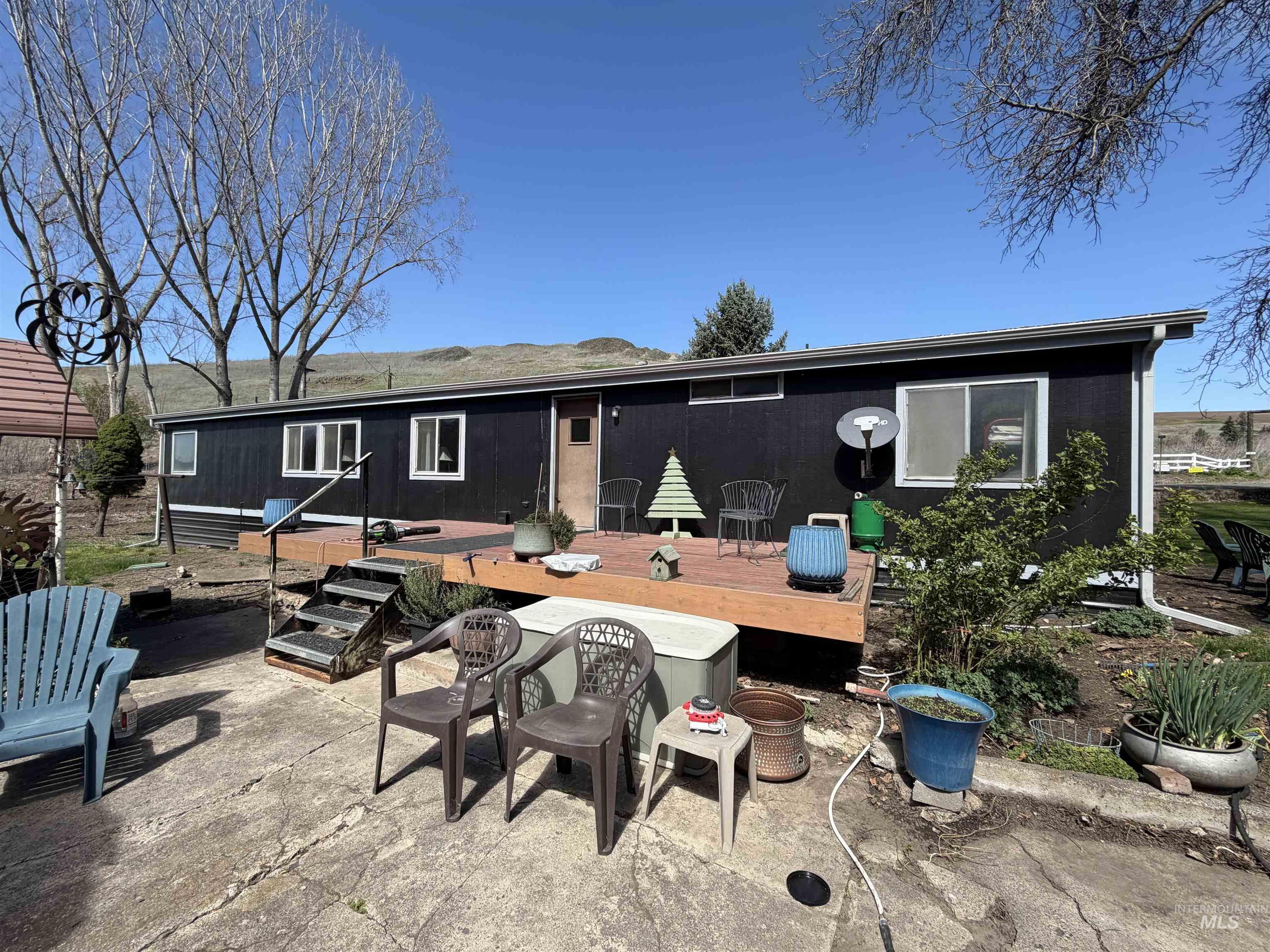 27474 North Tom Beall Road Lapwai, ID 83540 - Photo 5 of 50 Rear view of property featuring a deck