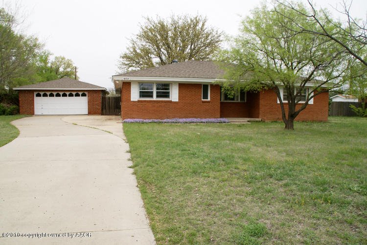 5124 Arden Road Amarillo, TX 79110 - Photo 3 of 42 a view of a house with a yard