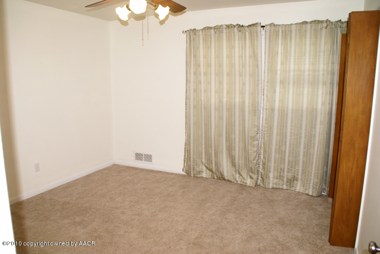5124 Arden Road Amarillo, TX 79110 - Photo 22 of 42 a view of a small space with a window