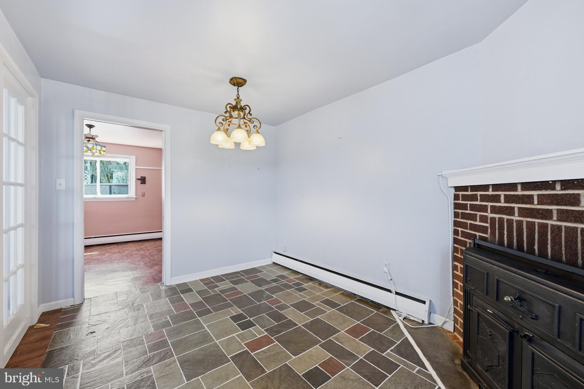 874 Sunset Lane Telford, PA 18969 - Photo 17 of 35 a view of an empty room with a chandelier
