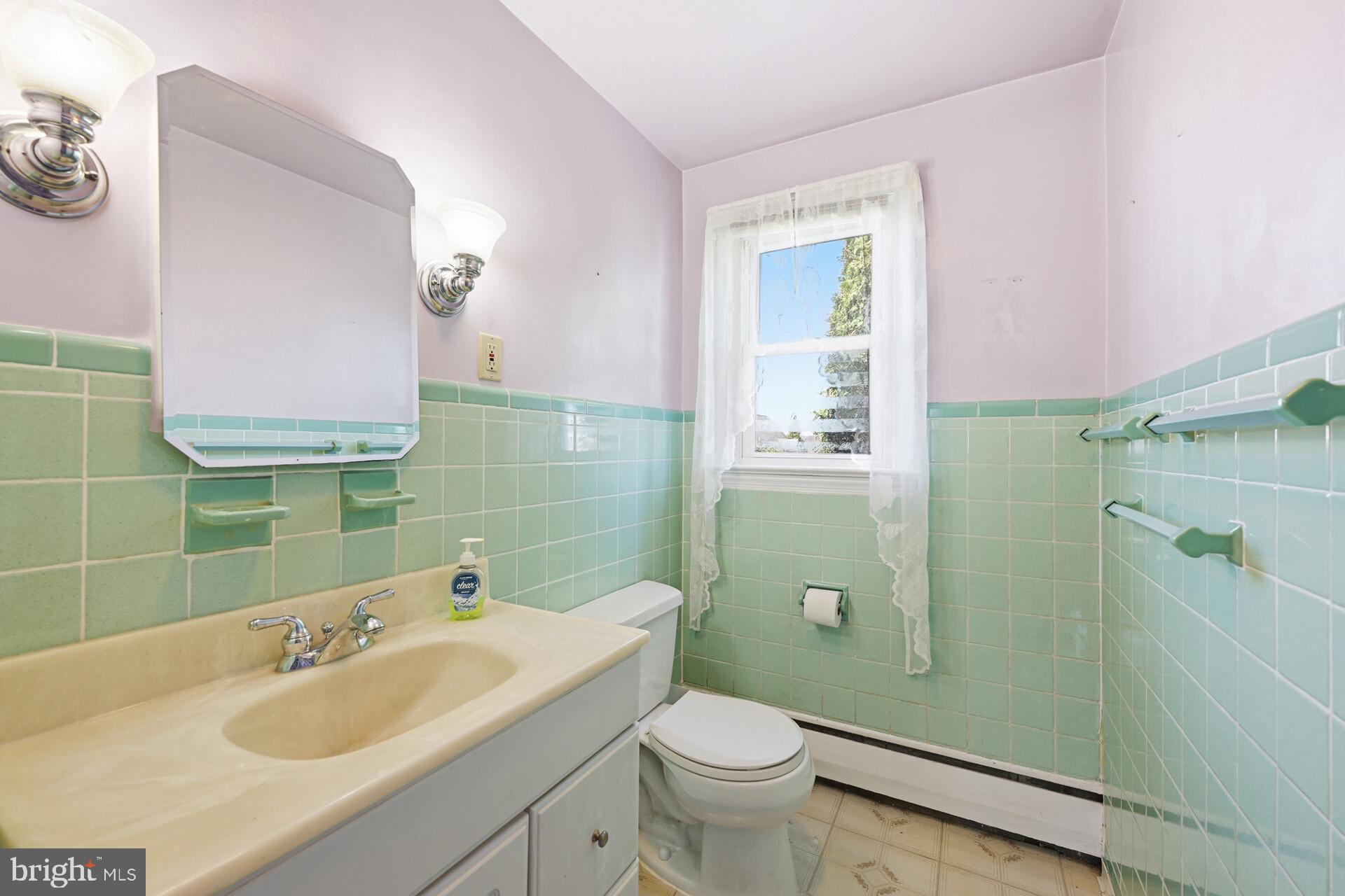 874 Sunset Lane Telford, PA 18969 - Photo 35 of 35 a bathroom with a sink toilet and shower