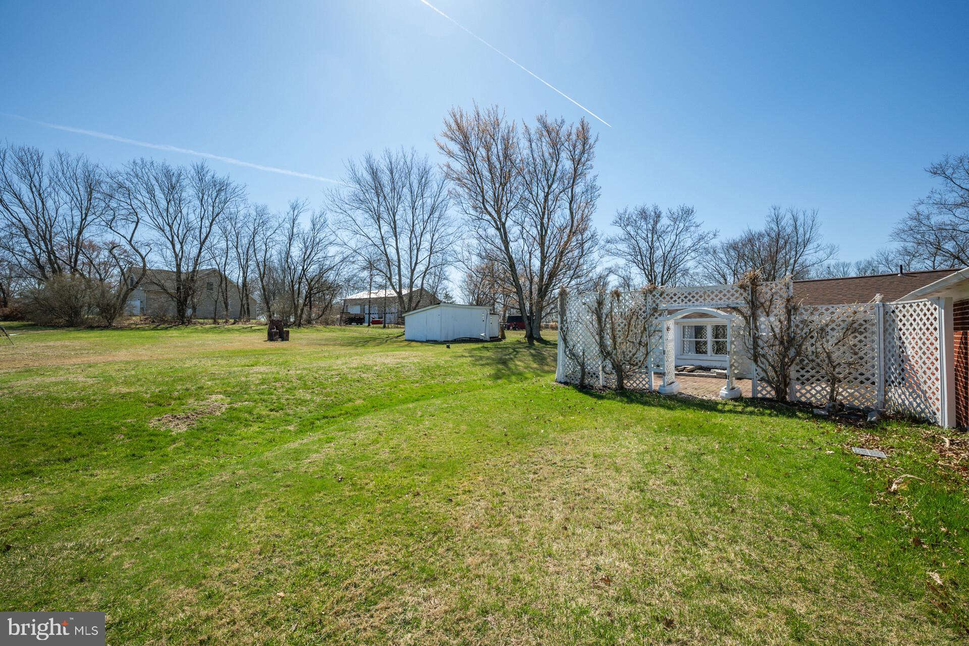 874 Sunset Lane Telford, PA 18969 - Photo 7 of 35 a backyard of a house with table and chairs