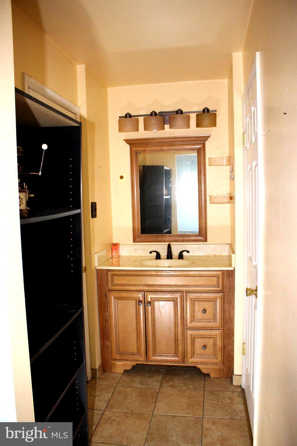146 Oakmont Road Clementon, NJ 08021 - Photo 48 of 61 Cozy bathroom with warm wood accents.