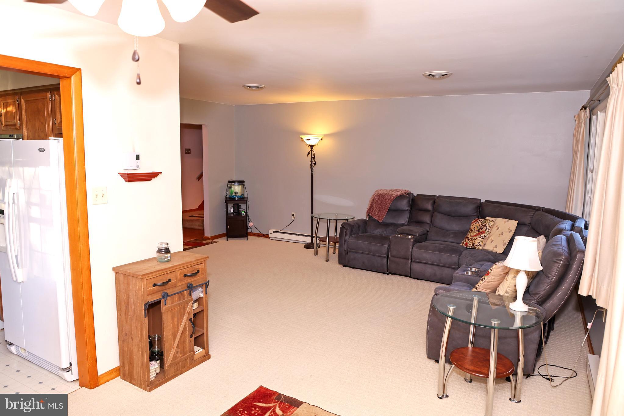 19717 Toms Road Boonsboro, MD 21713 - Photo 13 of 60 a living room with furniture