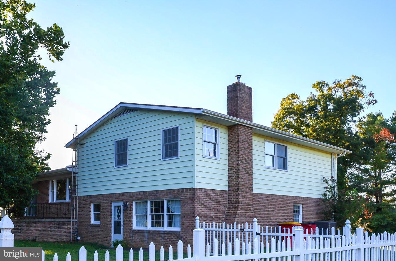 19717 Toms Road Boonsboro, MD 21713 - Photo 38 of 60 a front view of a house with a porch