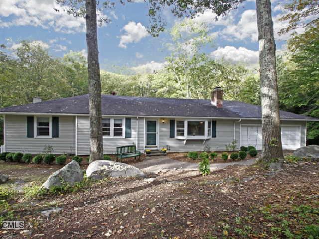 6 Hop Brook Road Brookfield, CT 06804 - Photo 1 of 1 a front view of a house with garden