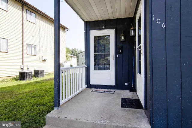 a view of a porch with a garden