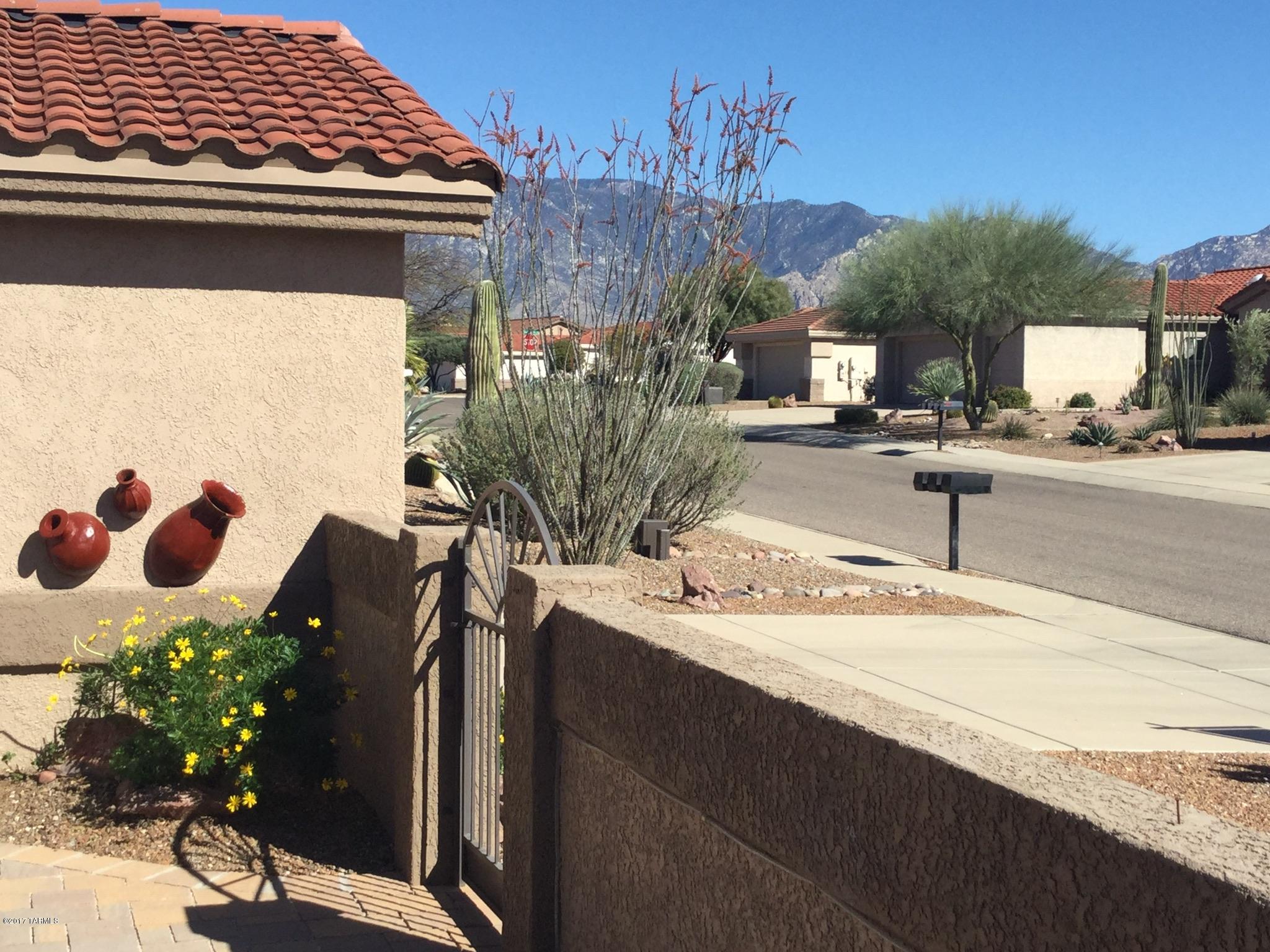 1065 East Royal Oak Road Oro Valley, AZ 85755 - Photo 2 of 19 a view of a house with outdoor space