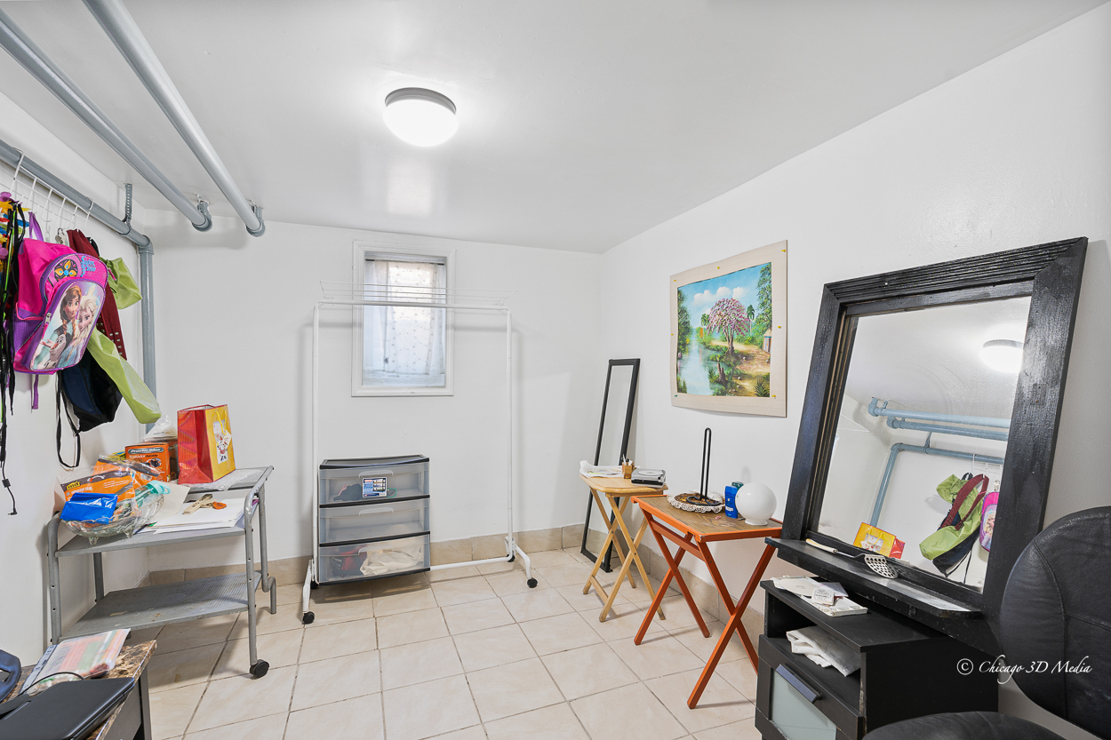 4954 West Byron Street Chicago, IL 60641 - Photo 28 of 42 a view of a workspace with furniture and a workspace