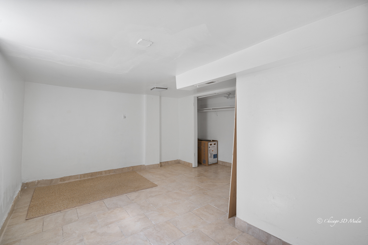 4954 West Byron Street Chicago, IL 60641 - Photo 35 of 42 a view of an empty room and a window