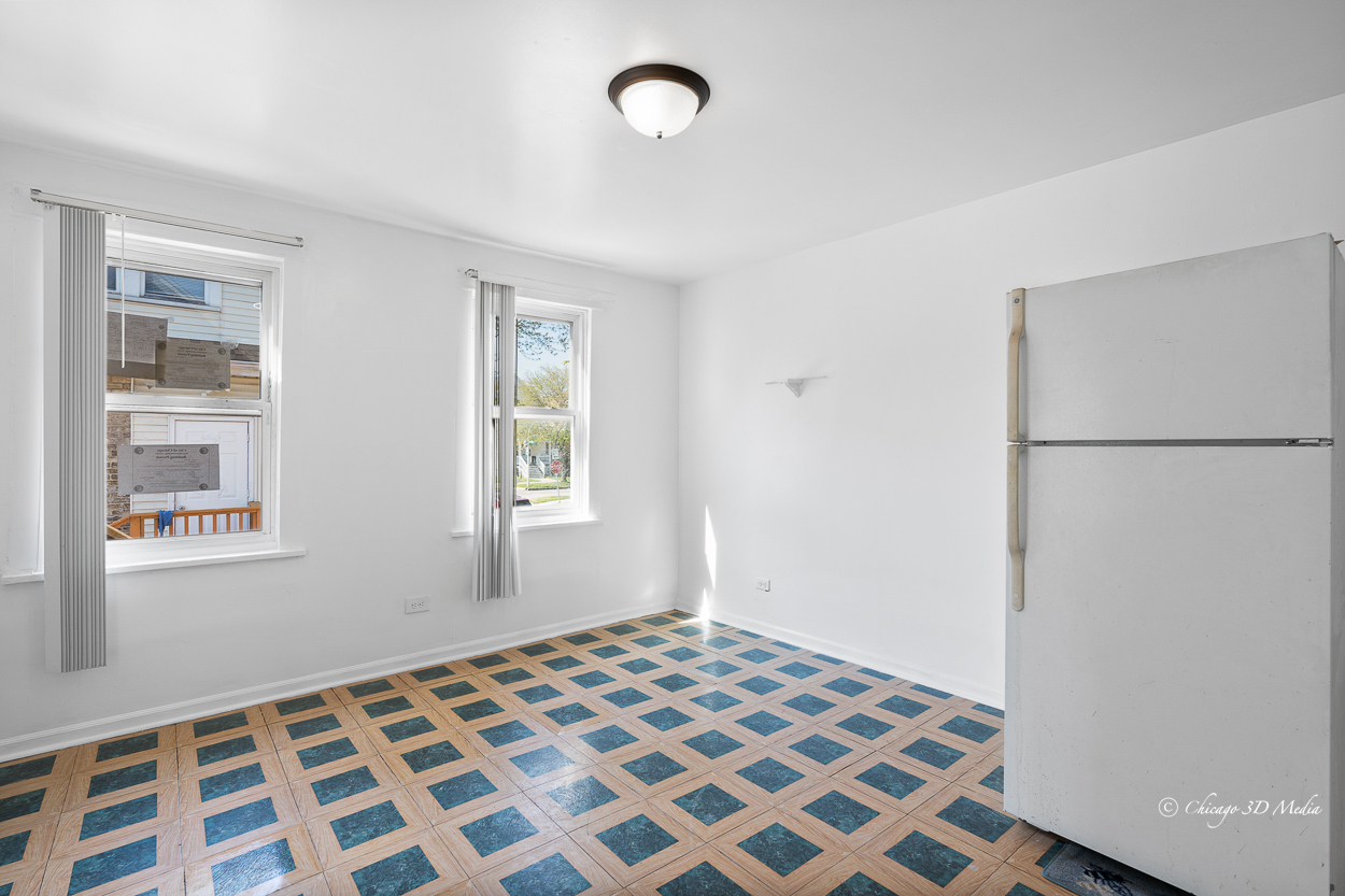 4954 West Byron Street Chicago, IL 60641 - Photo 37 of 42 a bedroom with a bed and a window