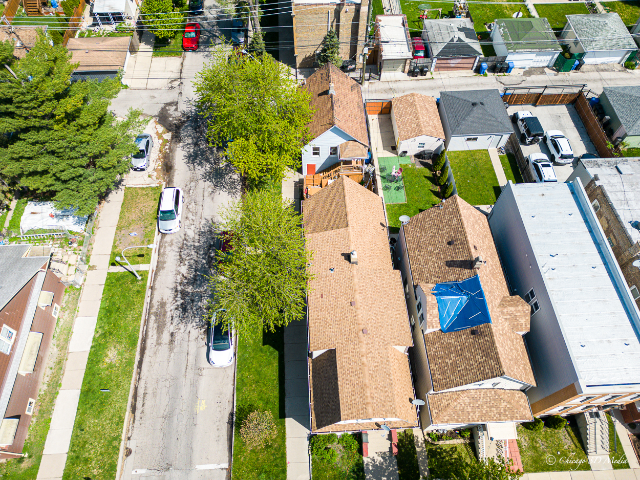 4954 West Byron Street Chicago, IL 60641 - Photo 4 of 42 an aerial view of residential houses with outdoor space