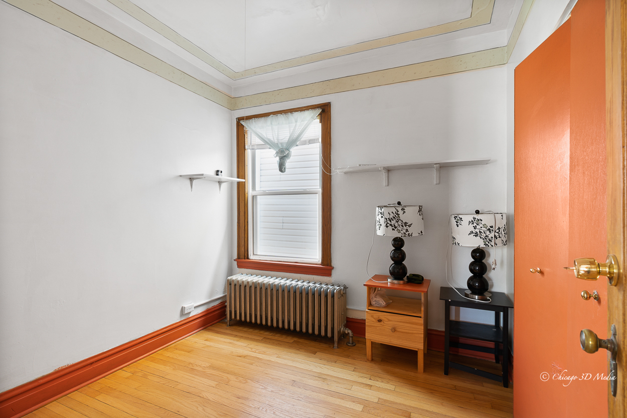 4954 West Byron Street Chicago, IL 60641 - Photo 9 of 42 a view of hallway with livingroom and furniture