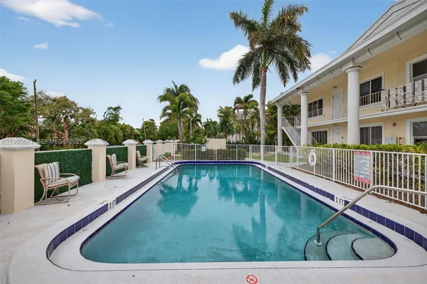 a view of a house with swimming pool