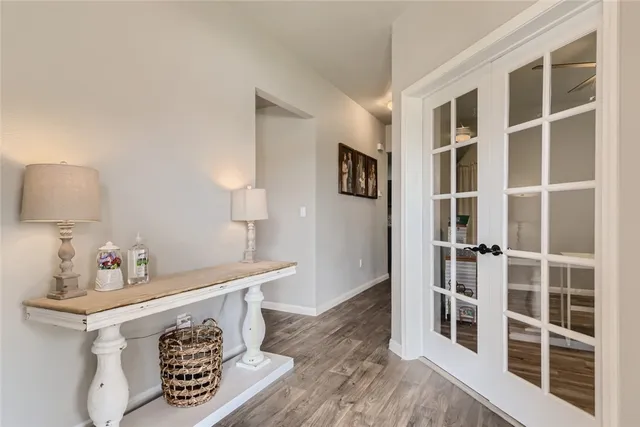 a room with furniture a rug and a window