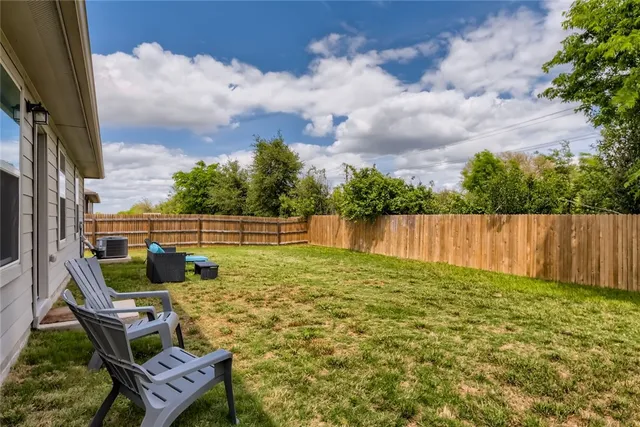 a garden view with a seating space