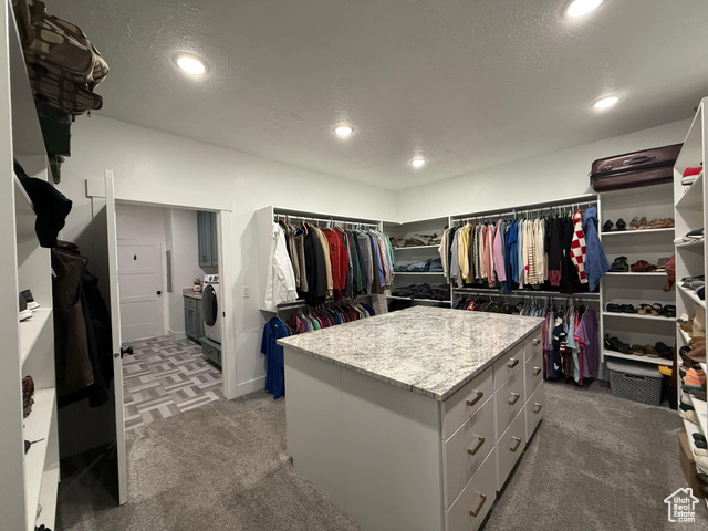 1240 West 2360 North Helper, UT 84526 - Photo 43 of 79 Spacious closet featuring light carpet and separate washer and dryer