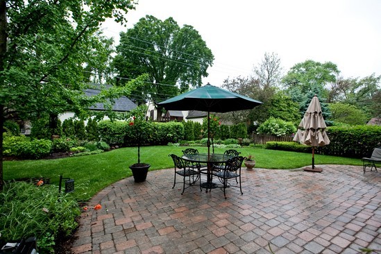 320 North County Line Road Hinsdale, IL 60521 - Photo 16 of 16 a view of table and chairs under an umbrella