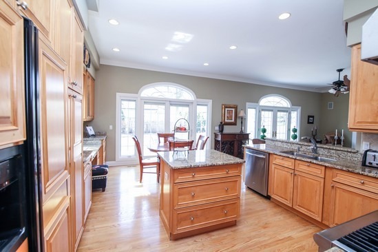 320 North County Line Road Hinsdale, IL 60521 - Photo 5 of 16 a dining hall with stainless steel appliances granite countertop a refrigerator and a view of living room