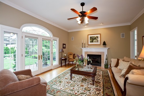 320 North County Line Road Hinsdale, IL 60521 - Photo 7 of 16 a living room with furniture and a fireplace
