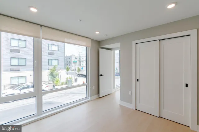 a view of hallway with windows