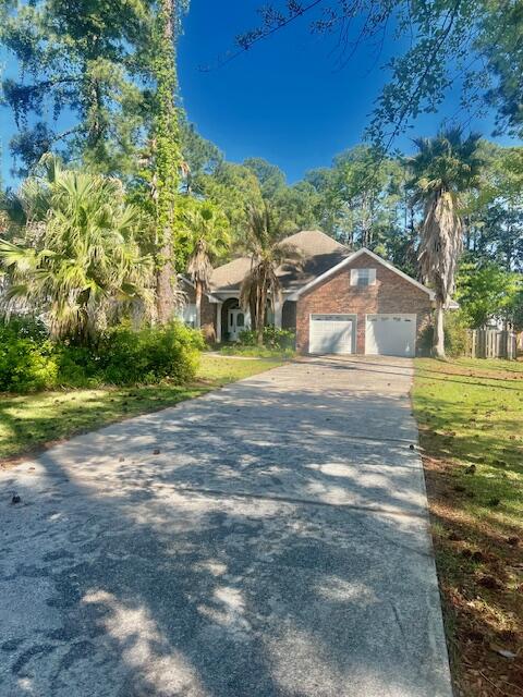 782 Driftwood Point Road Santa Rosa Beach, FL 32459 - Photo 2 of 33 a view of a house with a yard