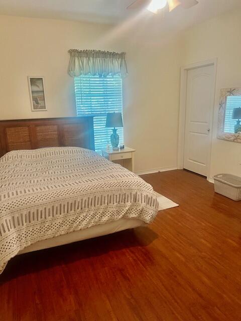 782 Driftwood Point Road Santa Rosa Beach, FL 32459 - Photo 22 of 33 a bed sitting in a bedroom next to a window