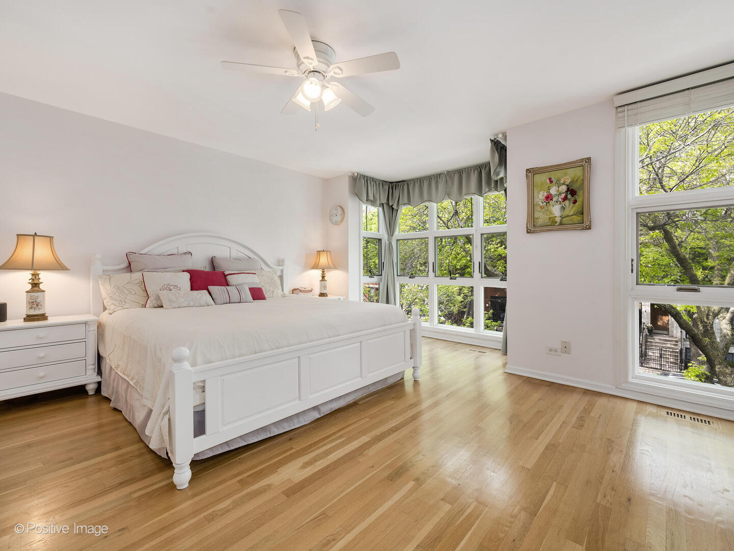 2393 North Wayne Avenue Chicago, IL 60614 - Photo 13 of 24 a bedroom with a large bed and a large window