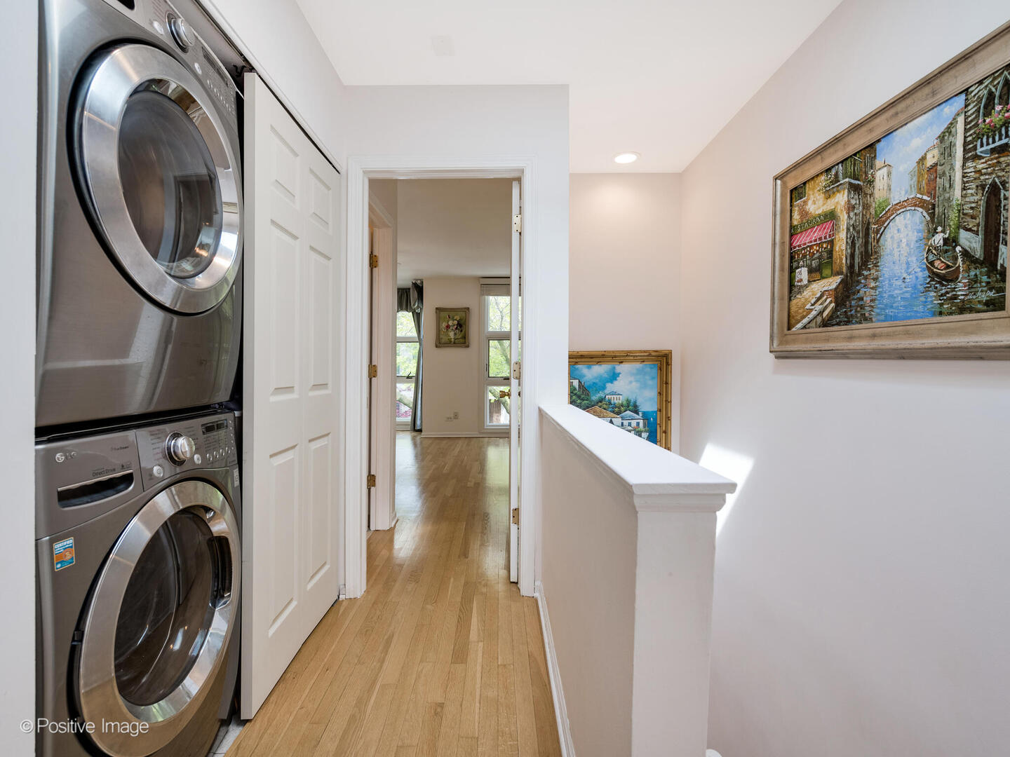 2393 North Wayne Avenue Chicago, IL 60614 - Photo 18 of 24 a view of a hallway with washer and dryer